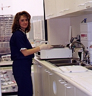 photo of a staff member sterilizing equipment